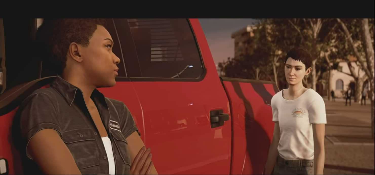 screenshot of Vienna and Cam standing in front of their truck